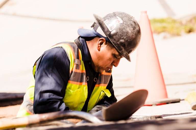 sewer line replacement worker