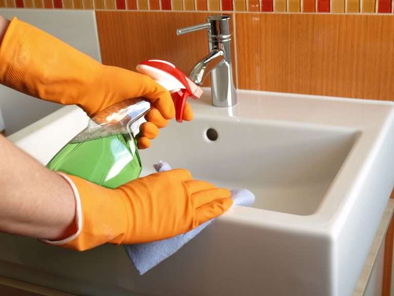 cleaning a bathroom sink