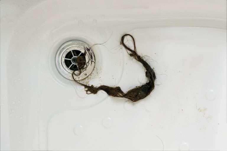 bathroom drain clogged with hair