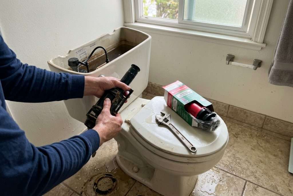 Replacing a toilet flush valve inside the tank
